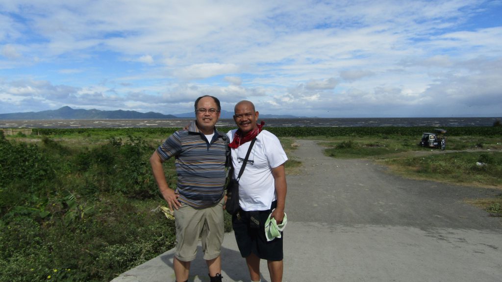 Bong and Arthur near the edge of Laguna de Bay in Bo. Mamatid, Cabuyao, Laguna Bong and Arthur near the edge of Laguna de Bay in Bo. Mamatid, Cabuyao, Laguna