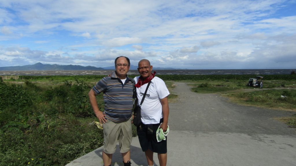 Bong and Arthur near the edge of Laguna de Bay in Bo. Mamatid, Cabuyao, Laguna