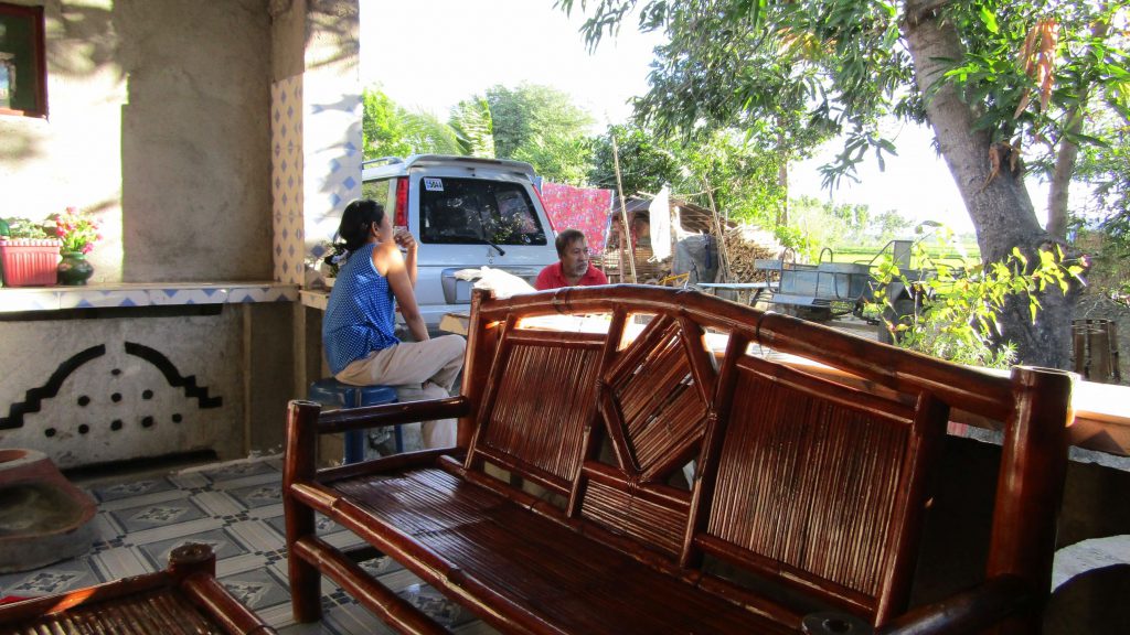 Rey chats with Winnie's mother before we departed for Manila