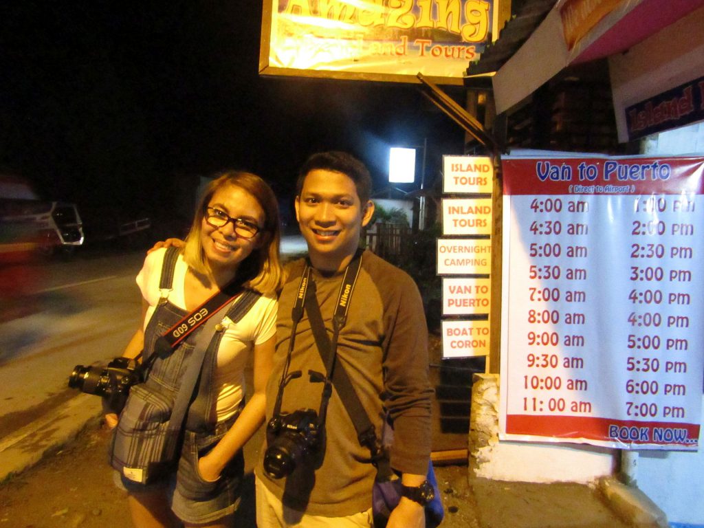 Roadside travel stall displays ride schedule from El Nido to Puerto Princesa