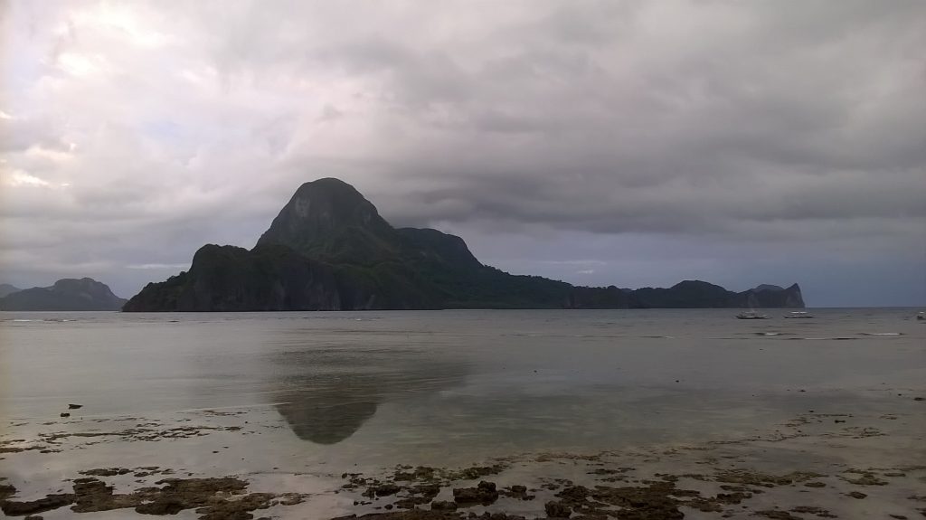 Cadlao Island looms in the distance