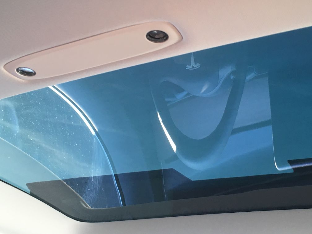 Manufactured by Saint-Gobain Sekurit --same ones found in luxury sedans and mostly European sports cars.