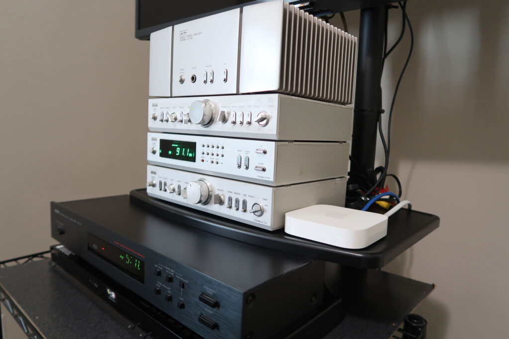 An Apple AirPort Express and Bluetooth Streaming Kit worth a total of $60 enabled audio streaming on this vintage Toshiba Aurex System 15, An Apple AirPort Express and Bluetooth Streaming Kit worth a total of $60 enabled audio streaming this vintage Toshiba Aurex System 15,